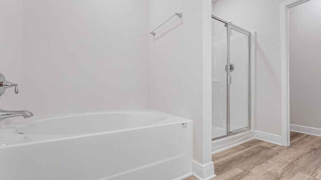 Representative furnished interior of a home built from the The Riverside by D.R. Horton in Hodges Bayou Plantation, Panama City (Image 14).