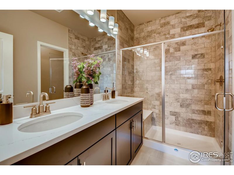 Photos of the same floorplan but different model in community.Primary Bathroom. Photos of the same floorplan but different model in community.Primary Bathroom.