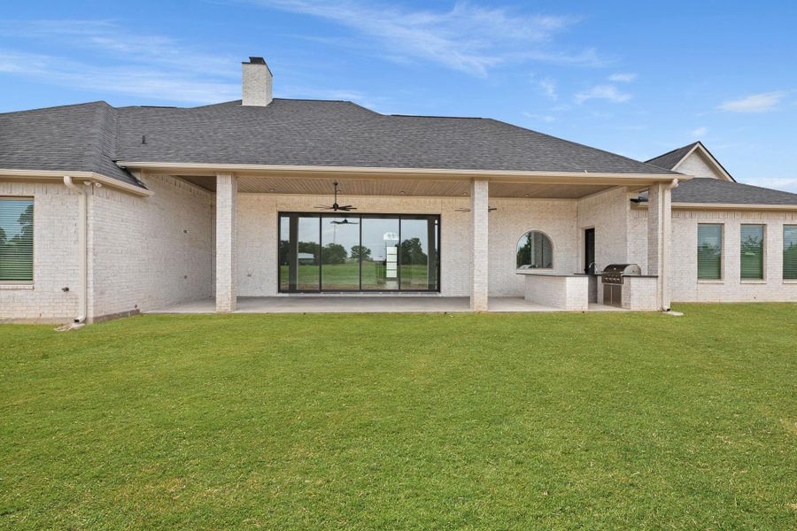 Exterior details and patio area of a home in , Bryan (Image 3).