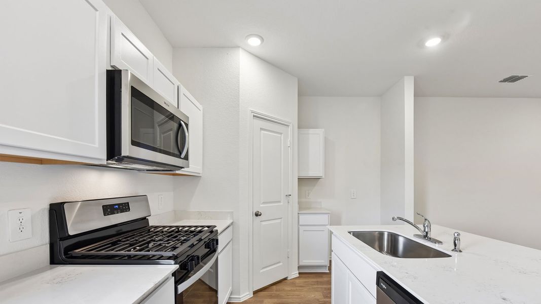 Furnished interior view inside a new home in Wayside, Uhland (Image 8).