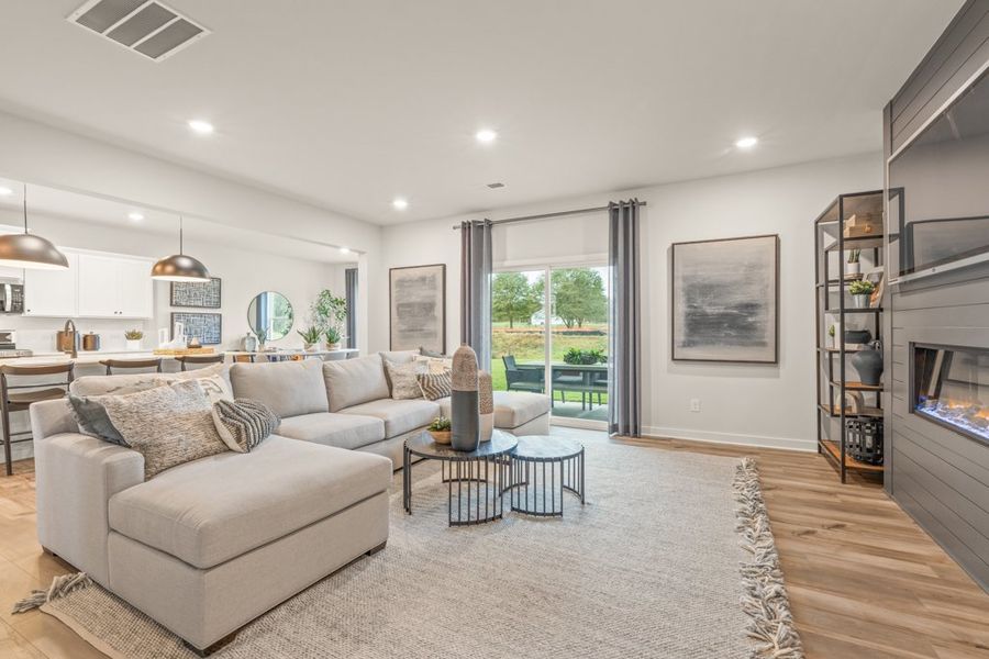 A living room with a large window.