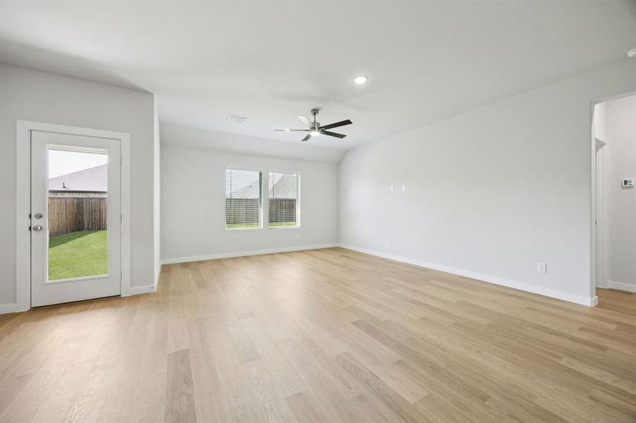 Living Room in the Heisman home plan by Trophy Signature Homes – REPRESENTATIVE PHOTO