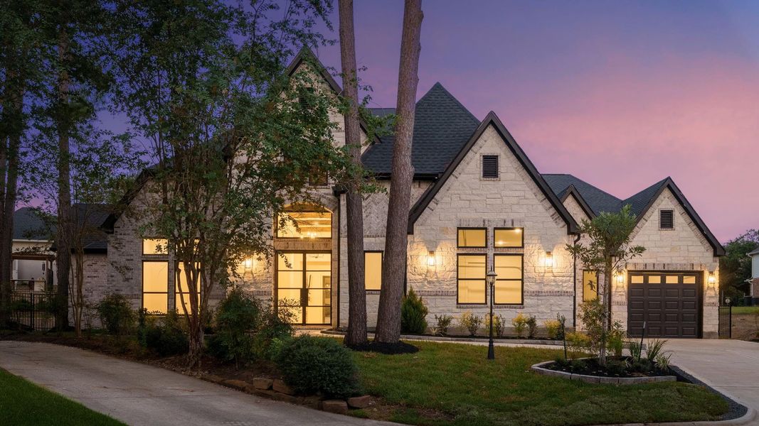 Front exterior of a new home in , Montgomery, TX, highlighting curb appeal (Image 24).