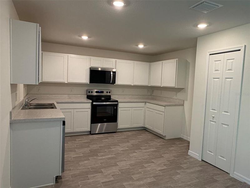 Furnished interior view inside a new home in Poinciana - Polk County, Poinciana (Image 4).