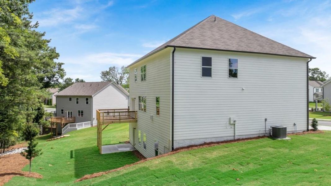 Exterior details and patio area of a home in Liberty Crossing, Braselton (Image 3).