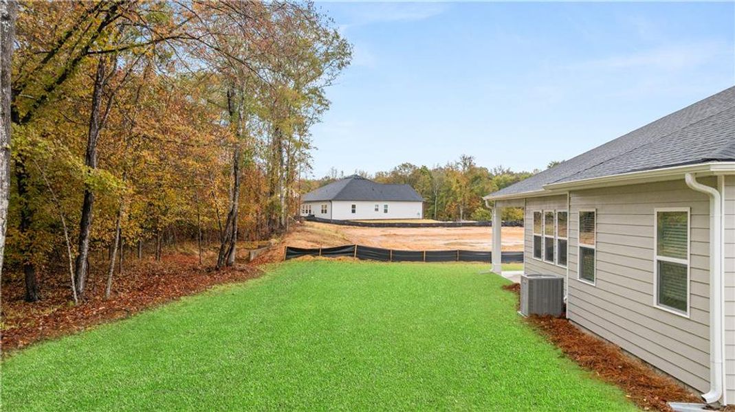 Exterior details and patio area of a home in Kingston Ranch at Lake Oconee, Buckhead (Image 18).