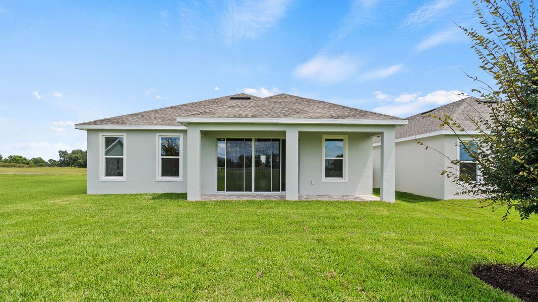 Rear Exterior Buttonwood Floor Plan in Trailside in Mount Dora by DRB Homes Rear Exterior Buttonwood Floor Plan in Trailside in Mount Dora by DRB Homes