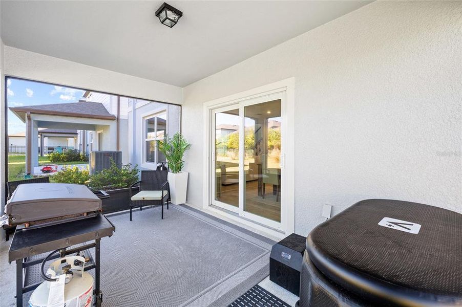Exterior details and patio area of a home in Waterset, Apollo Beach (Image 26).