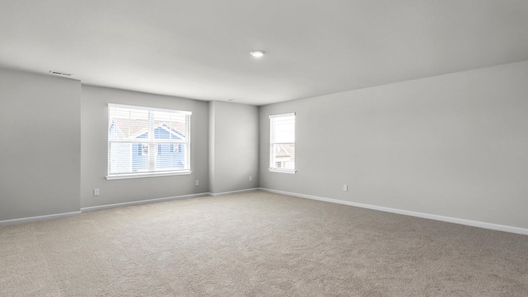 Spacious, unfurnished interior of a new home in Surfside Landing, Hubert (Image 22).