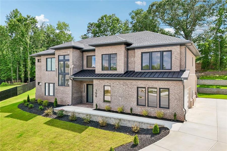 Front exterior of a new home in , Auburn, GA, highlighting curb appeal (Image 41). Front exterior of a new home in , Auburn, GA, highlighting curb appeal (Image 41).