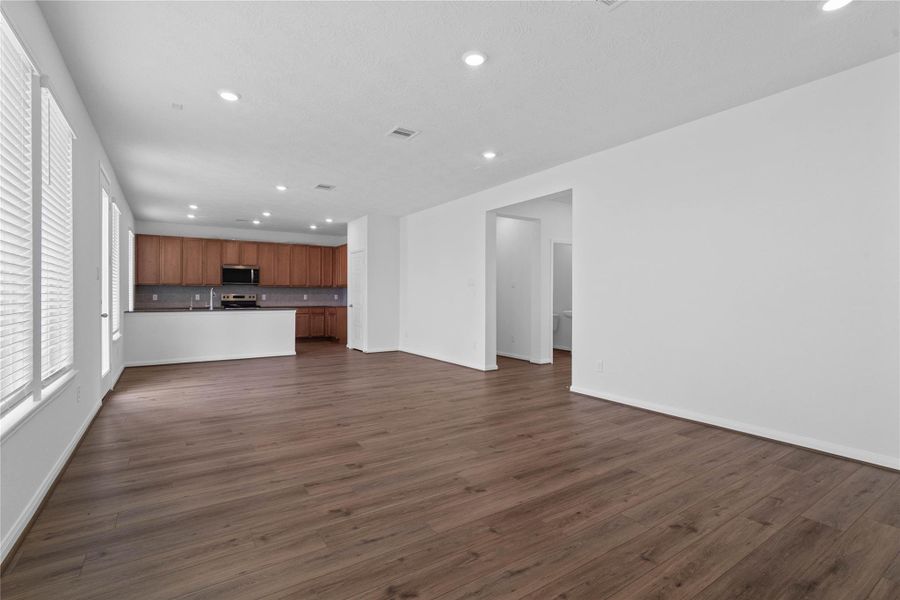 An entertainer’s dream! The expansive, open-concept main floor flows beautifully from room to room, keeping you connected to guests whether you're cooking in the kitchen or relaxing in the great room.