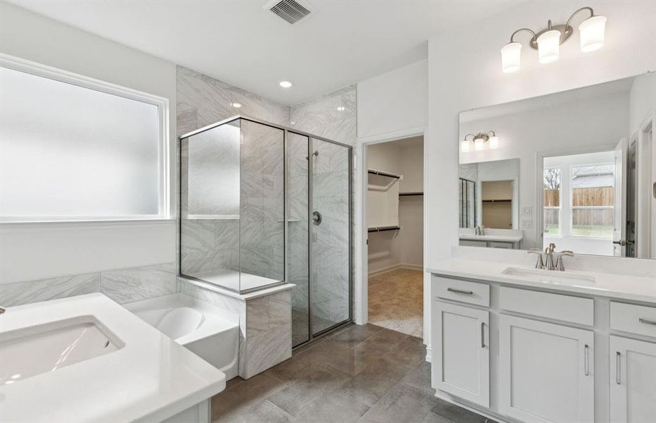 Owner's private bath with double vanity