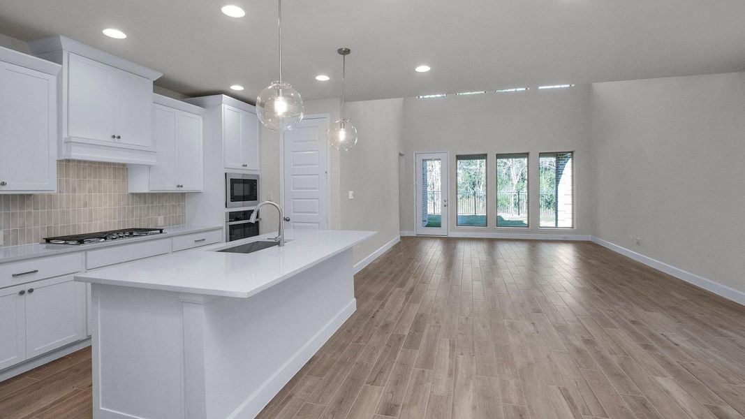 Furnished interior view inside a new home in Grand Central Park, Conroe (Image 7).