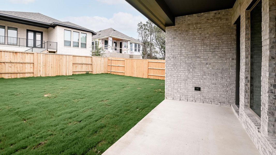Exterior details and patio area of a home in 6 Creeks, Kyle (Image 3).