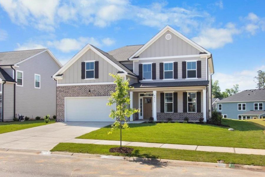 Front exterior of a new home in Tillery Park, Grovetown, GA, highlighting curb appeal (Image 1). Front exterior of a new home in Tillery Park, Grovetown, GA, highlighting curb appeal (Image 1).