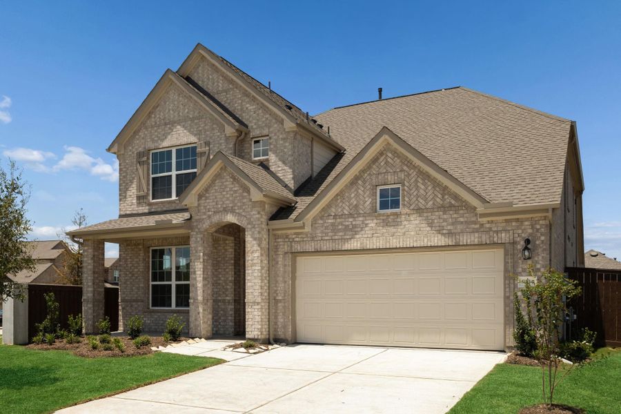 Front exterior of a new home in Brookewater, Rosenberg, TX, highlighting curb appeal (Image 21).