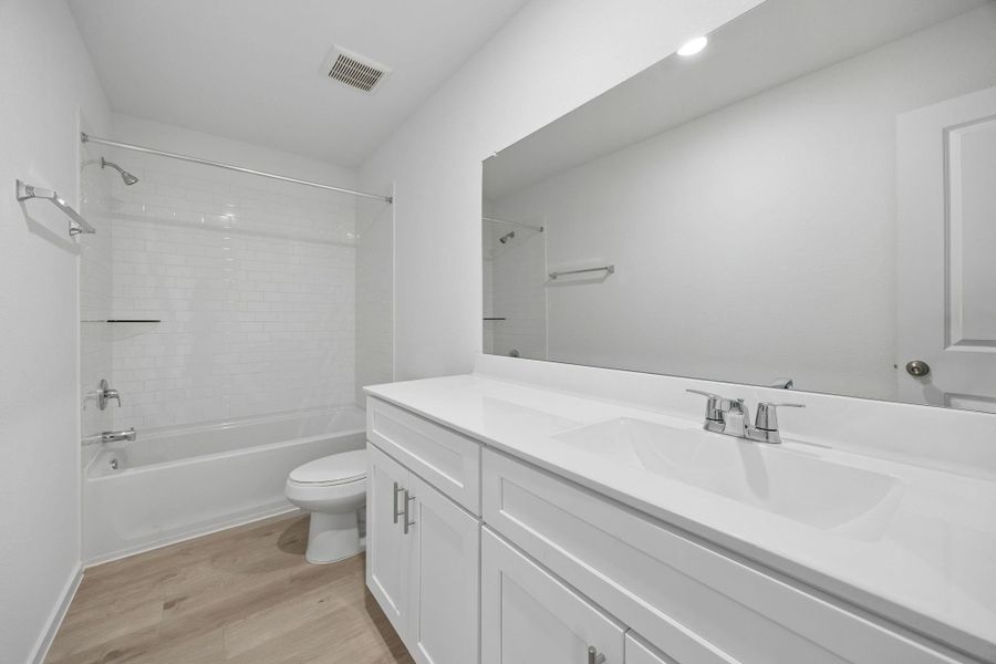 Furnished interior view inside a new home in Mavera, Conroe (Image 13).
