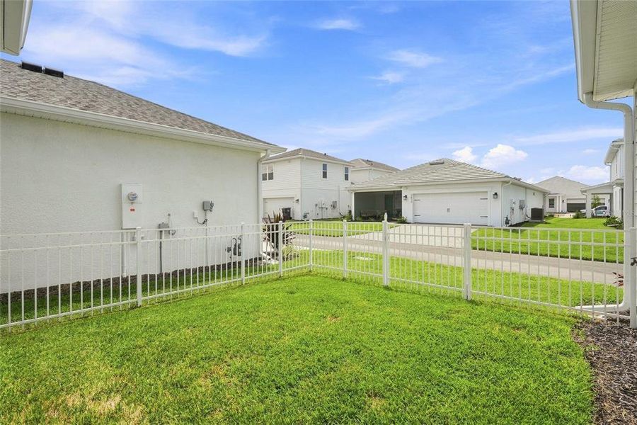 Exterior details and patio area of a home in SeaFlower – Bungalow Homes, Bradenton (Image 3).