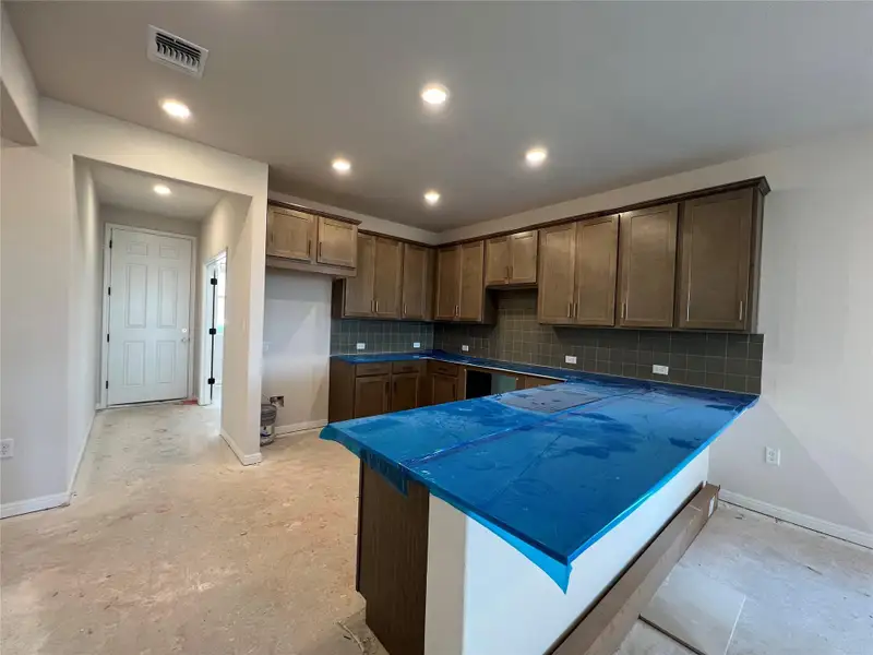 Furnished interior view inside a new home in Rolling Glen, Hutto (Image 5).