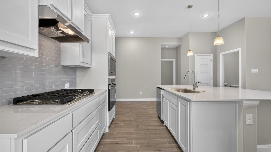 Representative furnished interior of a home built from the Desert Willow by D.R. Horton in Treeline, Justin (Image 9).