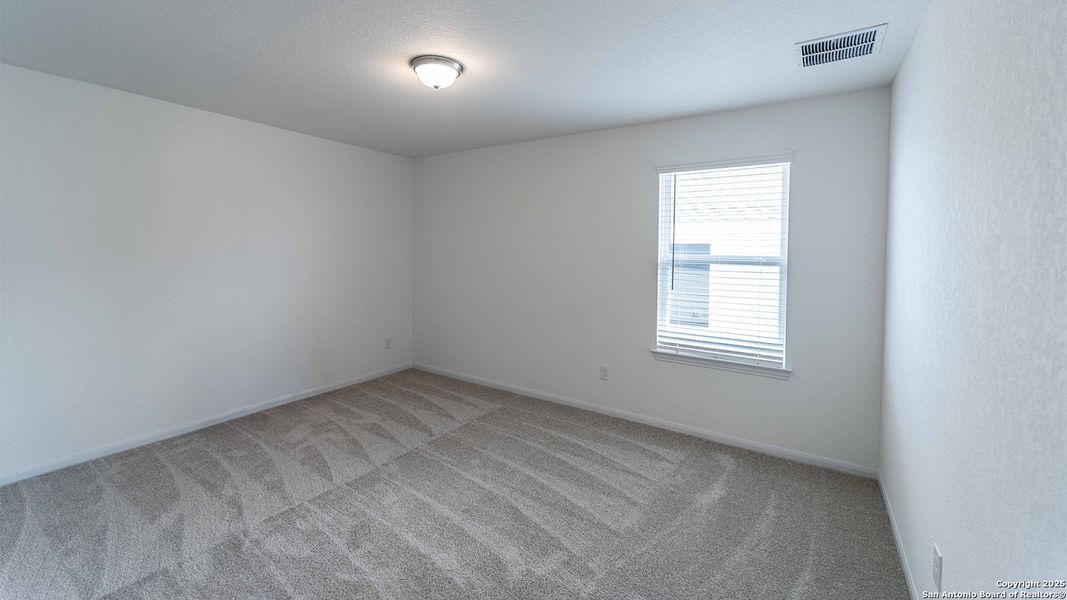 Spacious, unfurnished interior of a new home in Hunter's Ranch, San Antonio (Image 13).