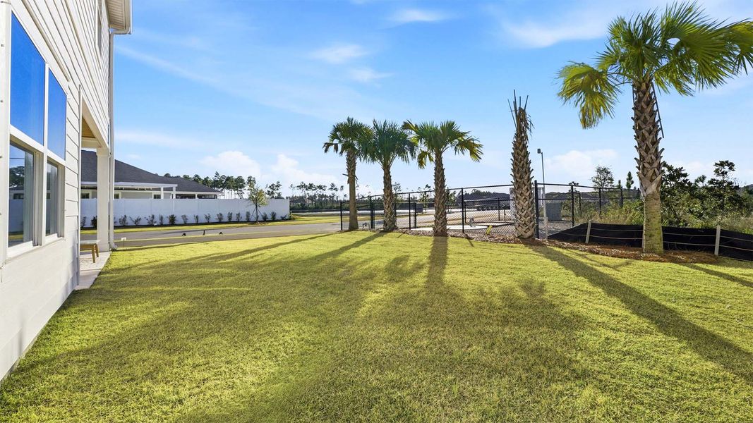 Exterior details and patio area of a home in Breakfast Point East Phase I, Panama City Beach (Image 3).