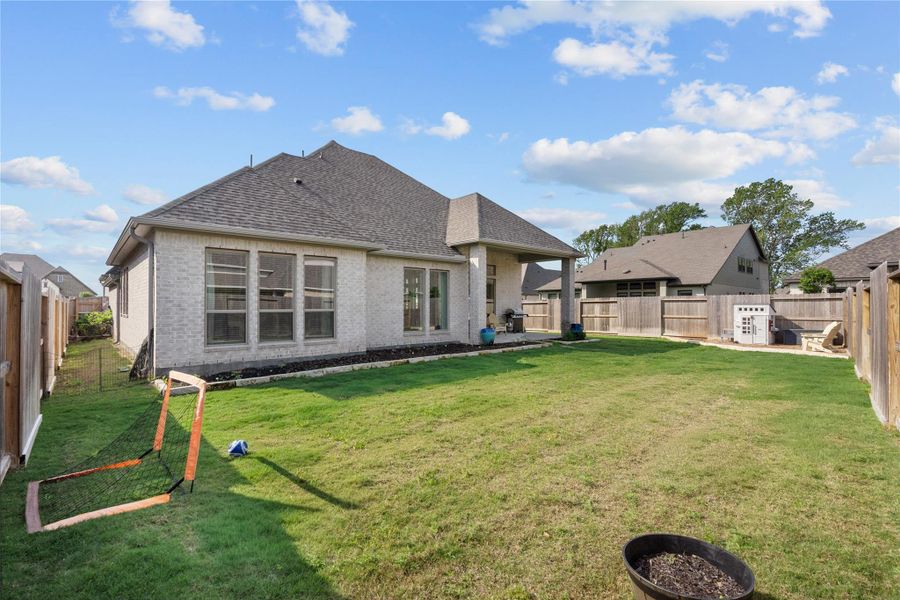 Exterior details and patio area of a home in Riceland, Mont Belvieu (Image 21).