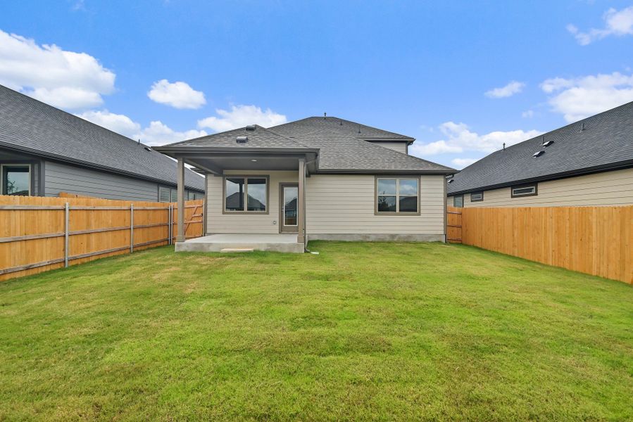Exterior details and patio area of a home in Prairie Winds, Hutto (Image 21).