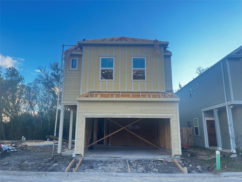 Three story home with 3 beds, 2.5 baths, and 2 car garage