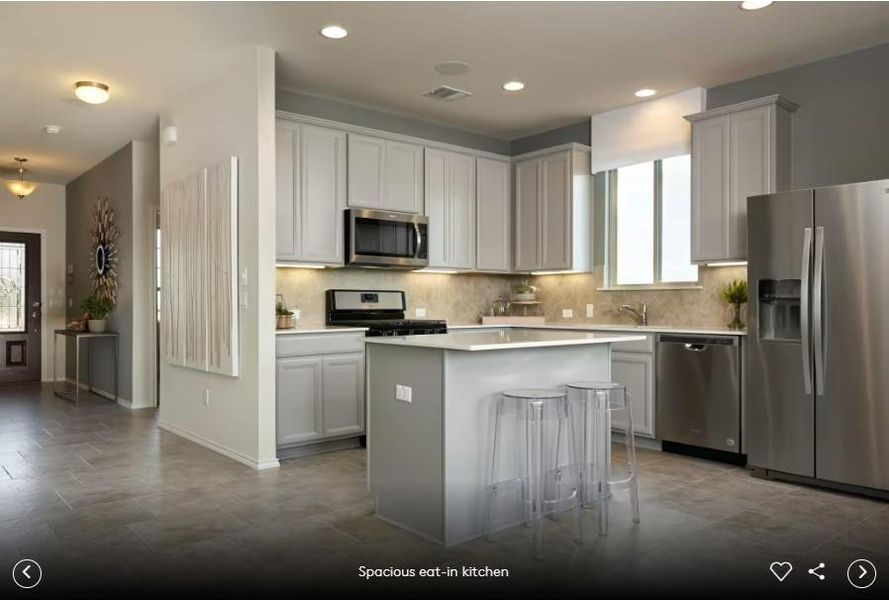 Interior photos- Photo of Pulte model home with same floor plan, not of actual home listed.
