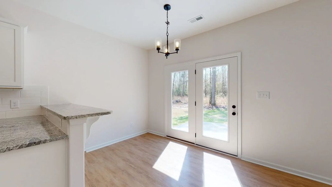 Representative unfurnished interior of a home built from the Catherine A by JC Jackson Homes,LLC in Heritage Pointe, Newport (Image 26).