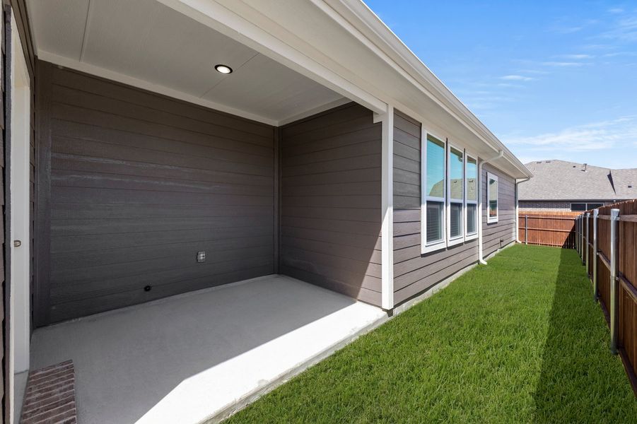 Front exterior of a new home in Heartland, Crandall, TX, highlighting curb appeal (Image 29). Front exterior of a new home in Heartland, Crandall, TX, highlighting curb appeal (Image 29).