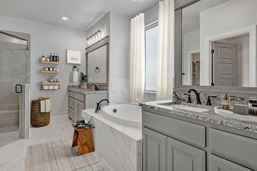 Bathroom with separate shower and tub and vanity