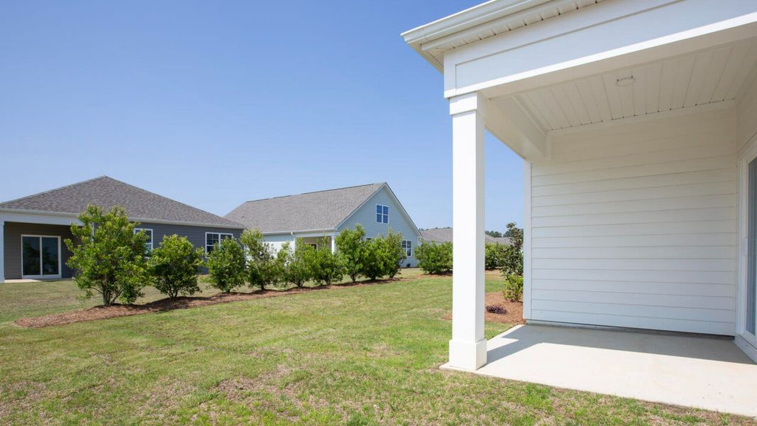Exterior details and patio area of a home in Saltgrass Landing, Winnabow (Image 2).