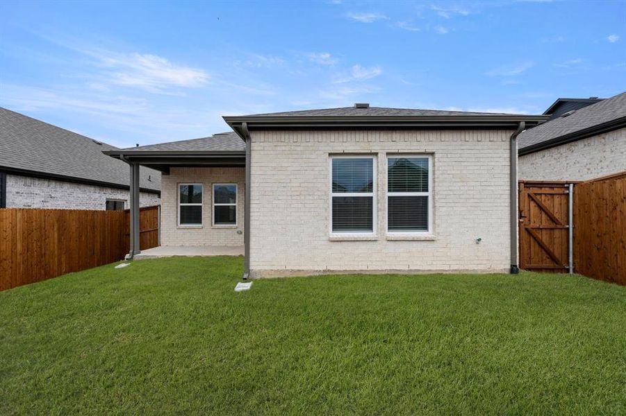 Exterior details and patio area of a home in The Villages of Hurricane Creek, Anna (Image 22). Exterior details and patio area of a home in The Villages of Hurricane Creek, Anna (Image 22).
