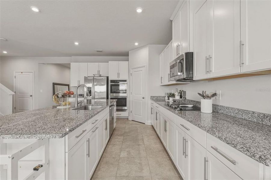 Furnished interior view inside a new home in West Port Single Family Homes, Port Charlotte (Image 13).