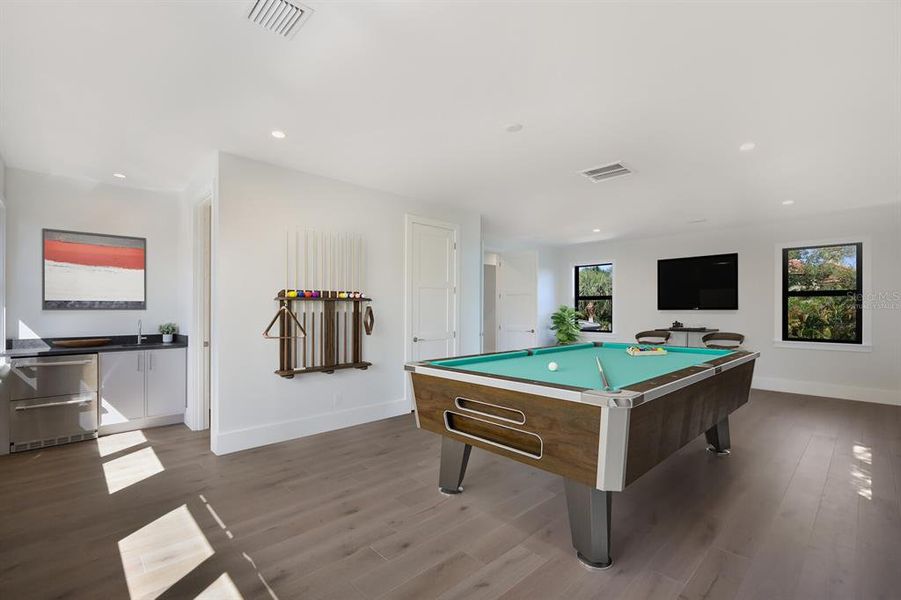 Huge bonus room with wet bar.  Could be converted to a second Primary Bedroom.  Virtually staged.