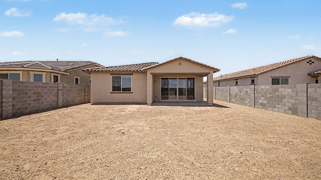Exterior details and patio area of a home in The Lakes at Rancho El Dorado, Maricopa (Image 21).