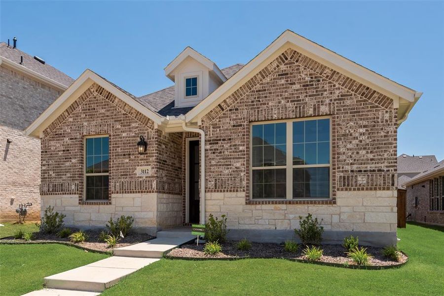 Front exterior of a new home in Arbors at Legacy Hills, Celina, TX, highlighting curb appeal (Image 2). Front exterior of a new home in Arbors at Legacy Hills, Celina, TX, highlighting curb appeal (Image 2).