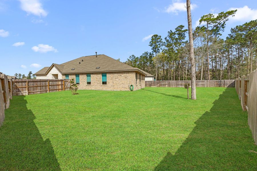 Exterior details and patio area of a home in Artavia: Avante Collection, Conroe (Image 28).