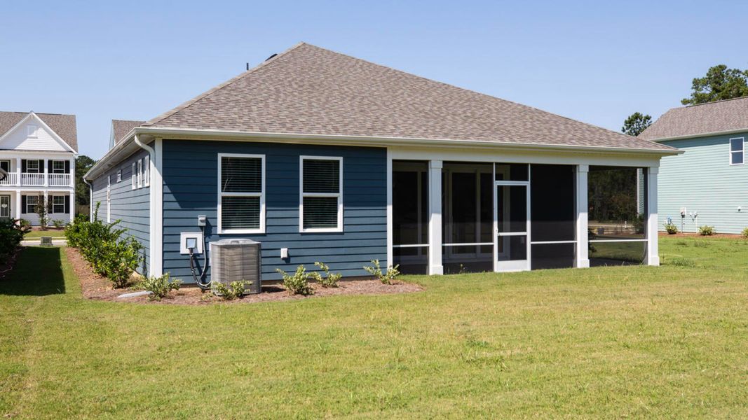 Exterior details and patio area of a home in The Haven at Indigo Preserve, Leland (Image 17).