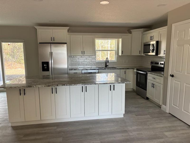Furnished interior view inside a new home in , Citrus Springs (Image 7). Furnished interior view inside a new home in , Citrus Springs (Image 7).