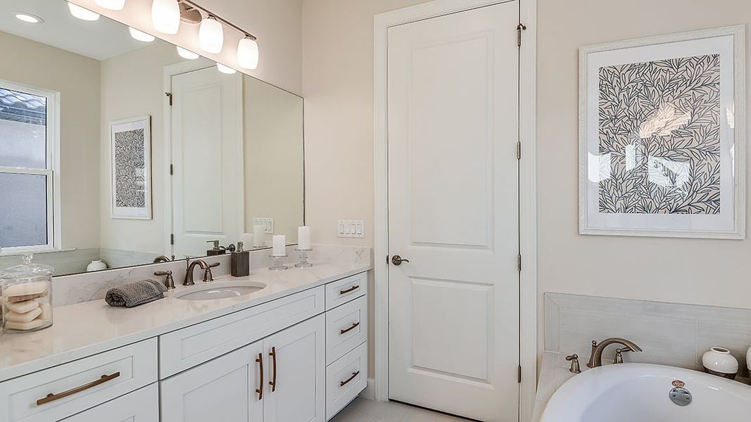 Furnished interior view inside a new home in Esplanade Lake Club, Fort Myers (Image 10).