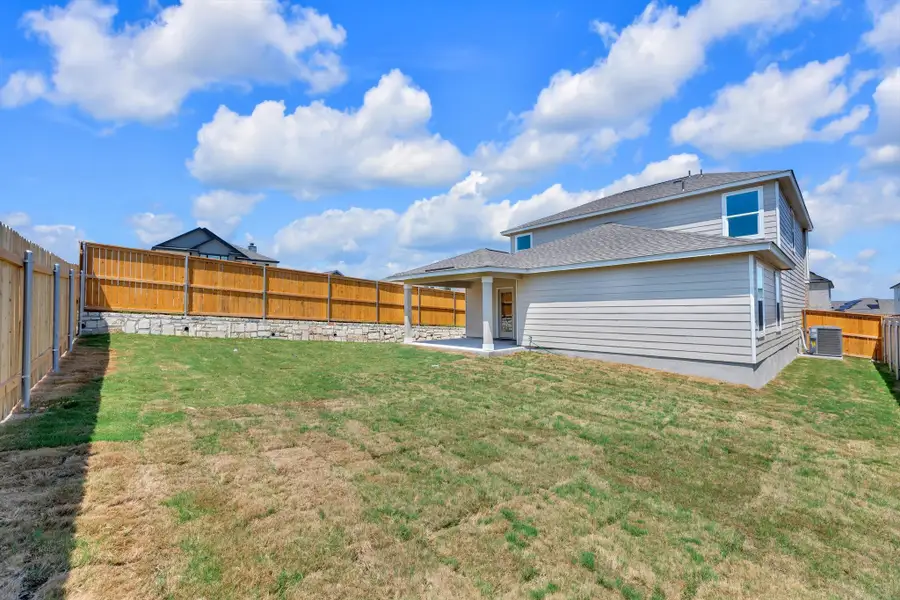 Front exterior of a new home in Sonterra - Cool Water, Jarrell, TX, highlighting curb appeal (Image 2).