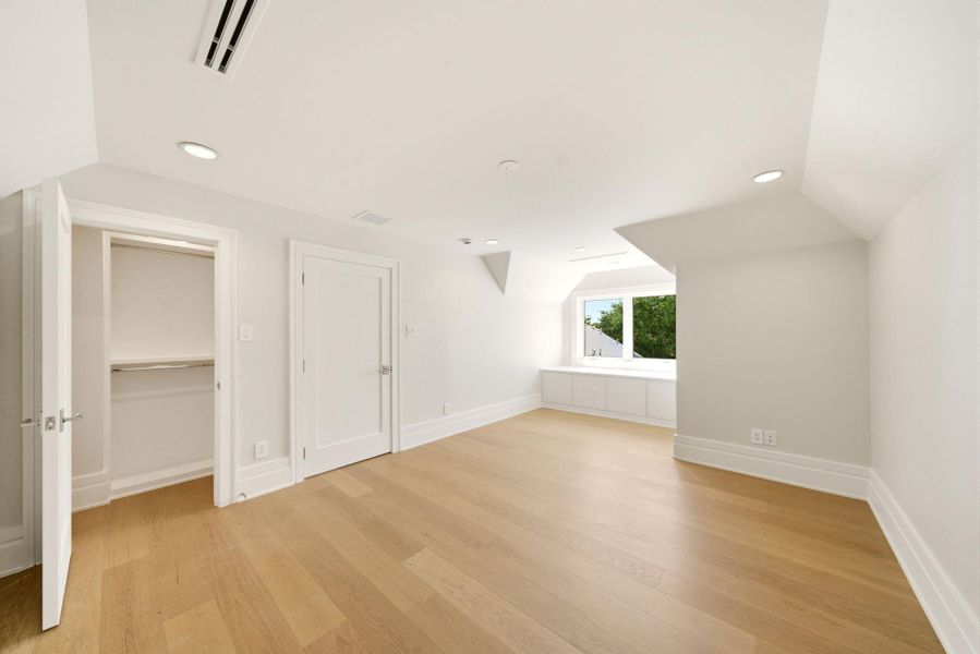 Guest suite/fourth bedroom privately located on the third floor. Walk-in closet and nearby full bathroom. Guest suite/fourth bedroom privately located on the third floor. Walk-in closet and nearby full bathroom.