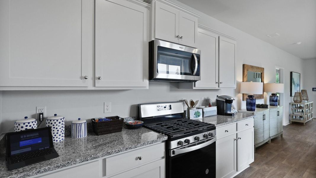 Furnished interior view inside a new home in Pine Hills at Cane Bay, Summerville (Image 34). Furnished interior view inside a new home in Pine Hills at Cane Bay, Summerville (Image 34).