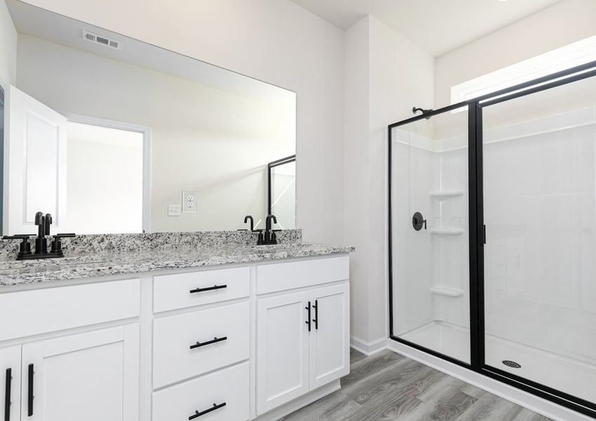 The master bathroom includes plenty of counter space