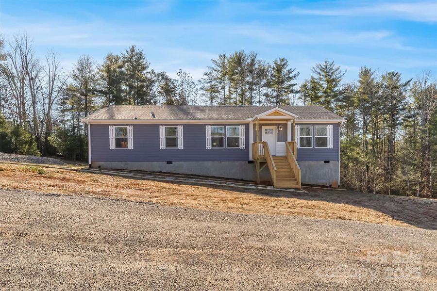 Exterior details and patio area of a home in , Weaverville (Image 29).
