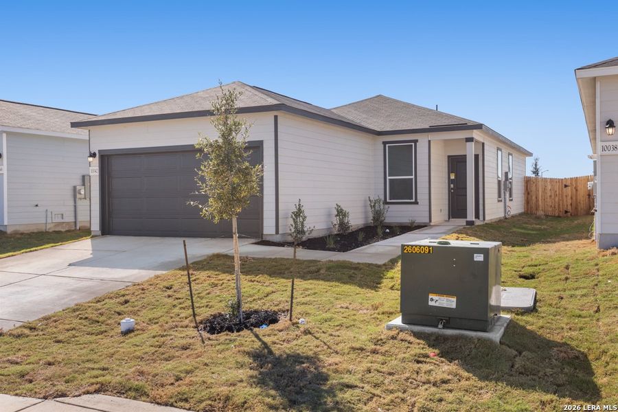 Front exterior of a new home in Punta Verde, Converse, TX, highlighting curb appeal (Image 19).