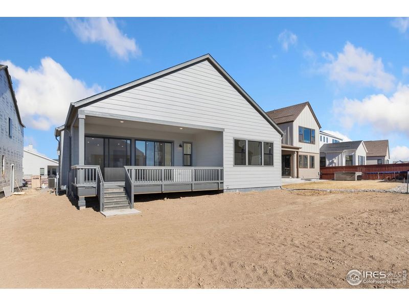 Exterior details and patio area of a home in Festival at RainDance, Windsor (Image 2).